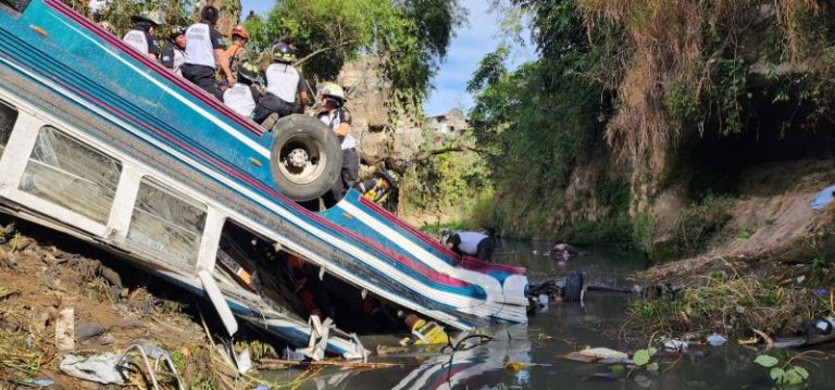 At least 50 die in Guatemala after bus plunges off bridge